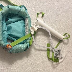 Teal Baby hanging bouncer with White hook